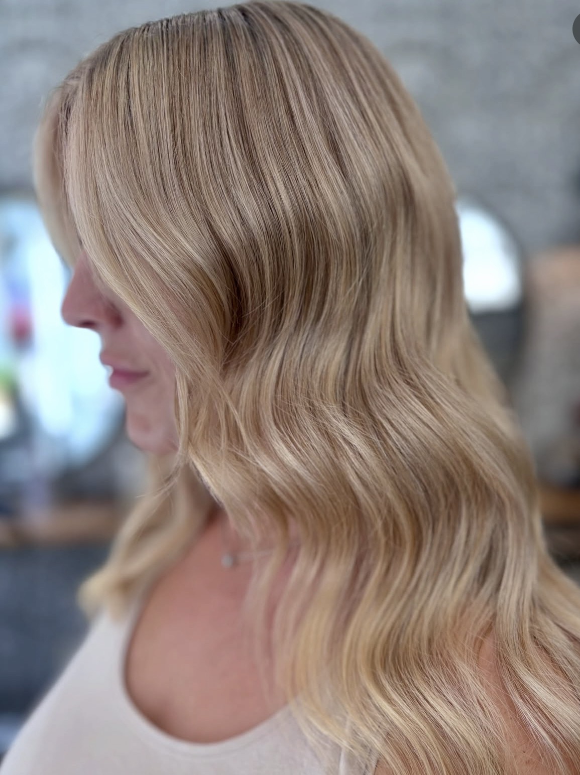 Long blonde waves finished at The Nook